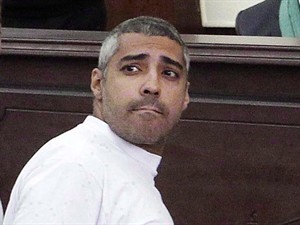 Mohammed Fahmy appears in a Cairo courtrrom on March 31, 2014. The family of a Canadian-Egyptian journalist imprisoned in Cairo says they have requested his ... - fahmy_mohammed